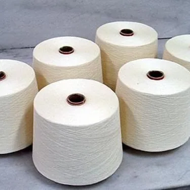 Cones of undyed yarn